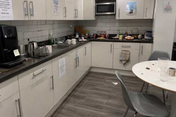 A messy office kitchen top